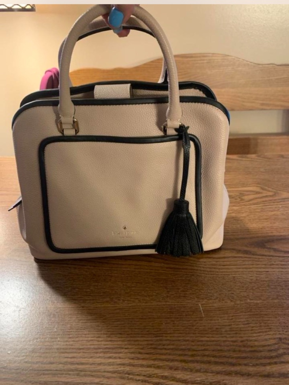 kate spade Cream Pebbled Satchel with Black Trim and Tassel